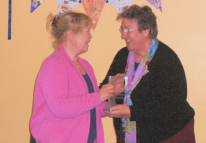 Dot Curtis receiving the award.