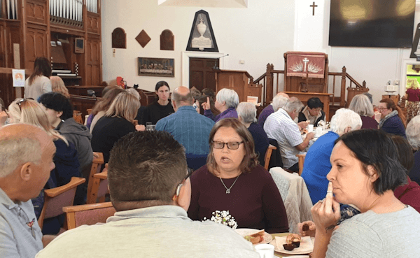 Guests at the volunteer lunch in the United Reformed Church.